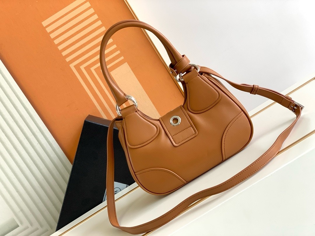 Pra*a moon bag in caramel padded nappa leather