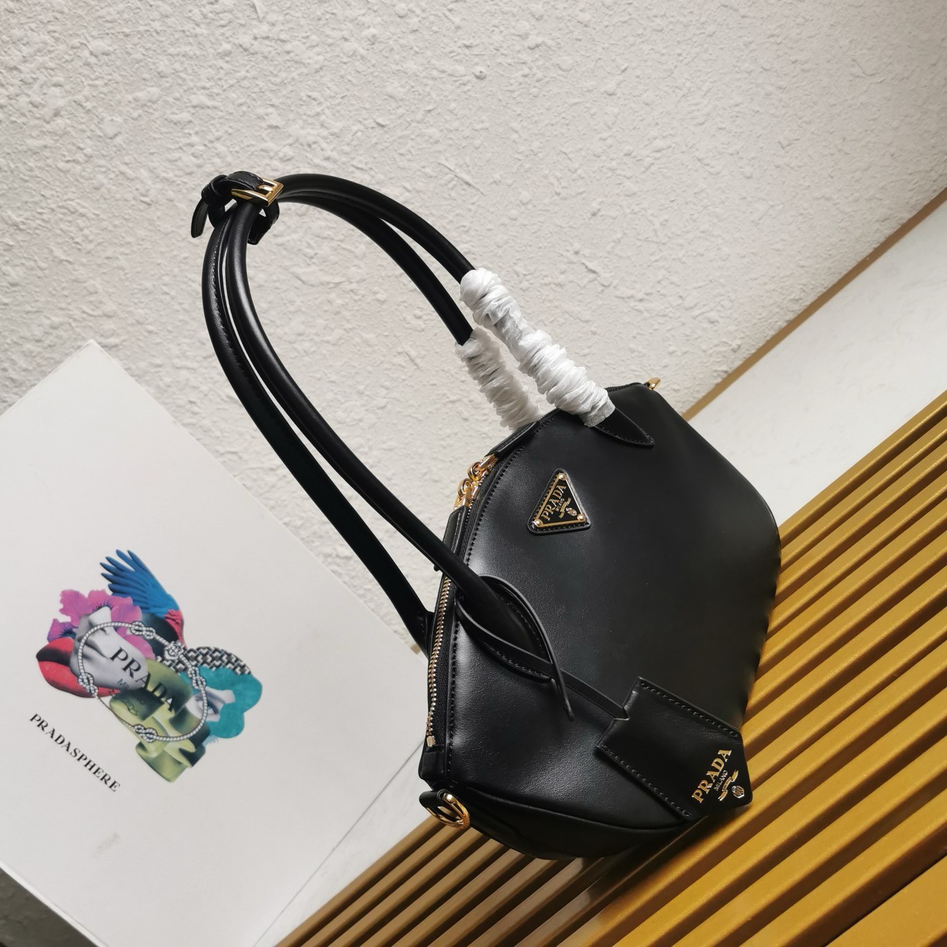 Pra*a shoulder bag with double zipper in black calfskin