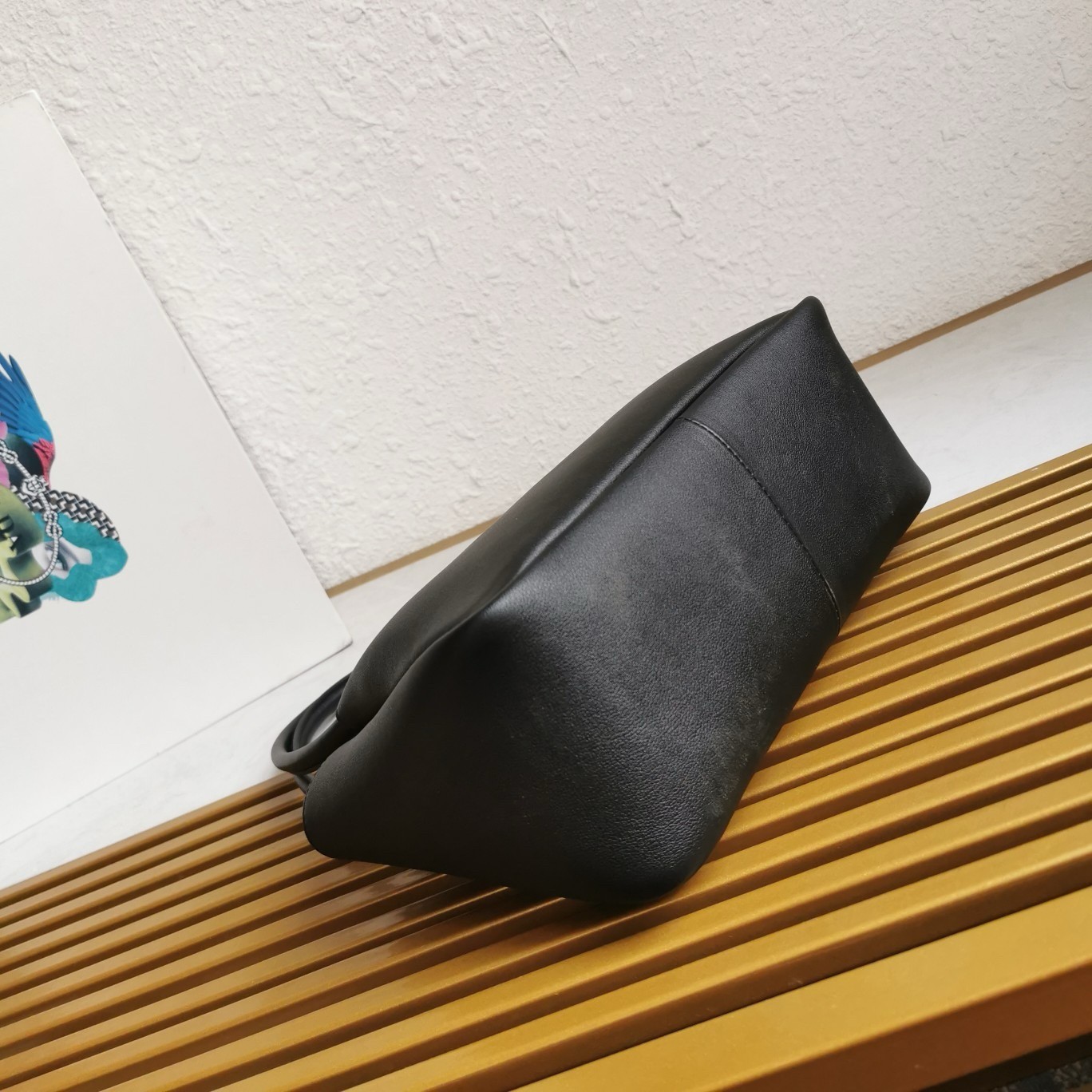 Pra*a shoulder bag in black calfskin with triangle logo