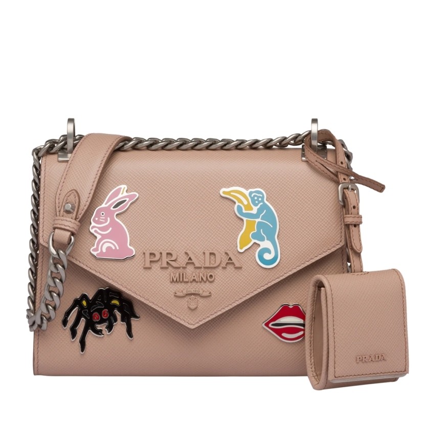 pra*a nude monoCh*0me flap bag with metal appliques