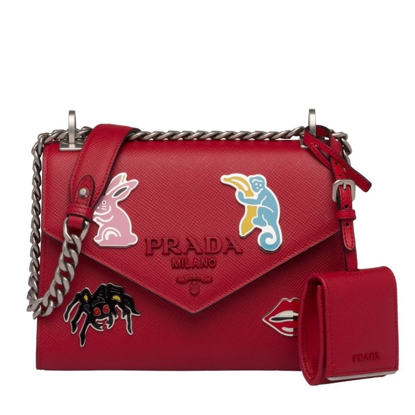 pra*a red monoCh*0me flap bag with metal appliques
