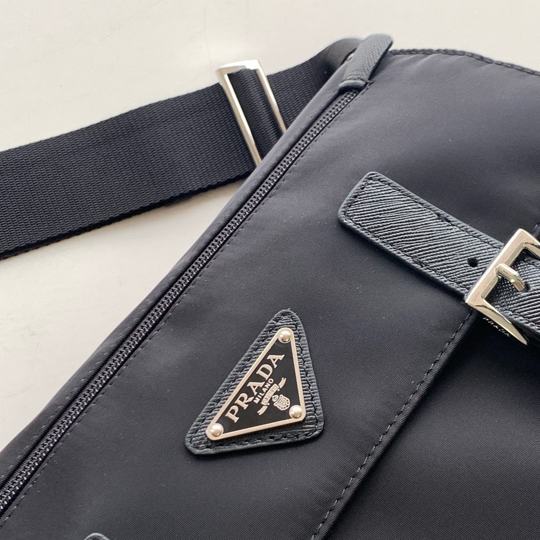 Pra*a shoulder bag with flap in black re-nylon