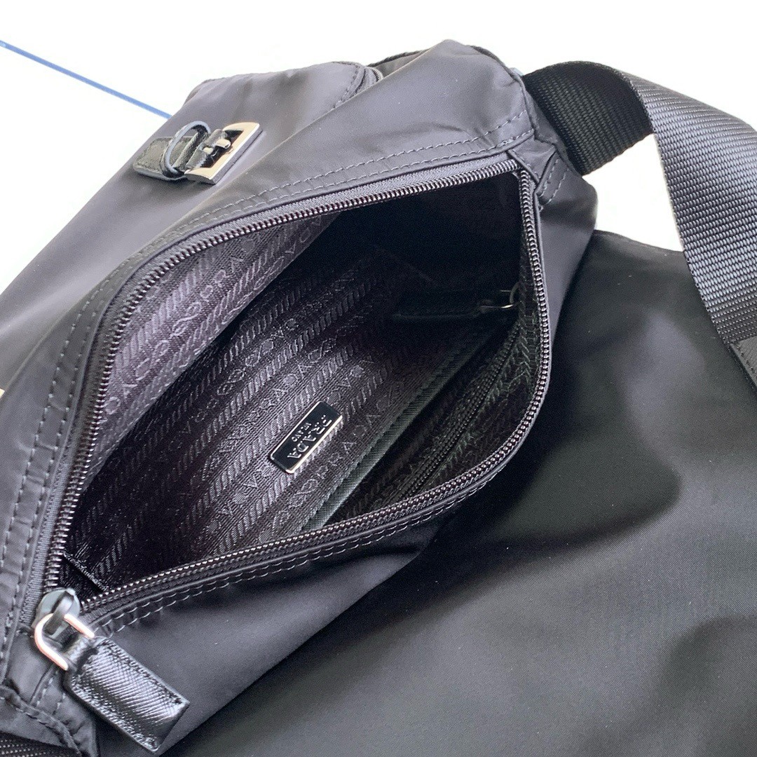 Pra*a shoulder bag with flap in black re-nylon