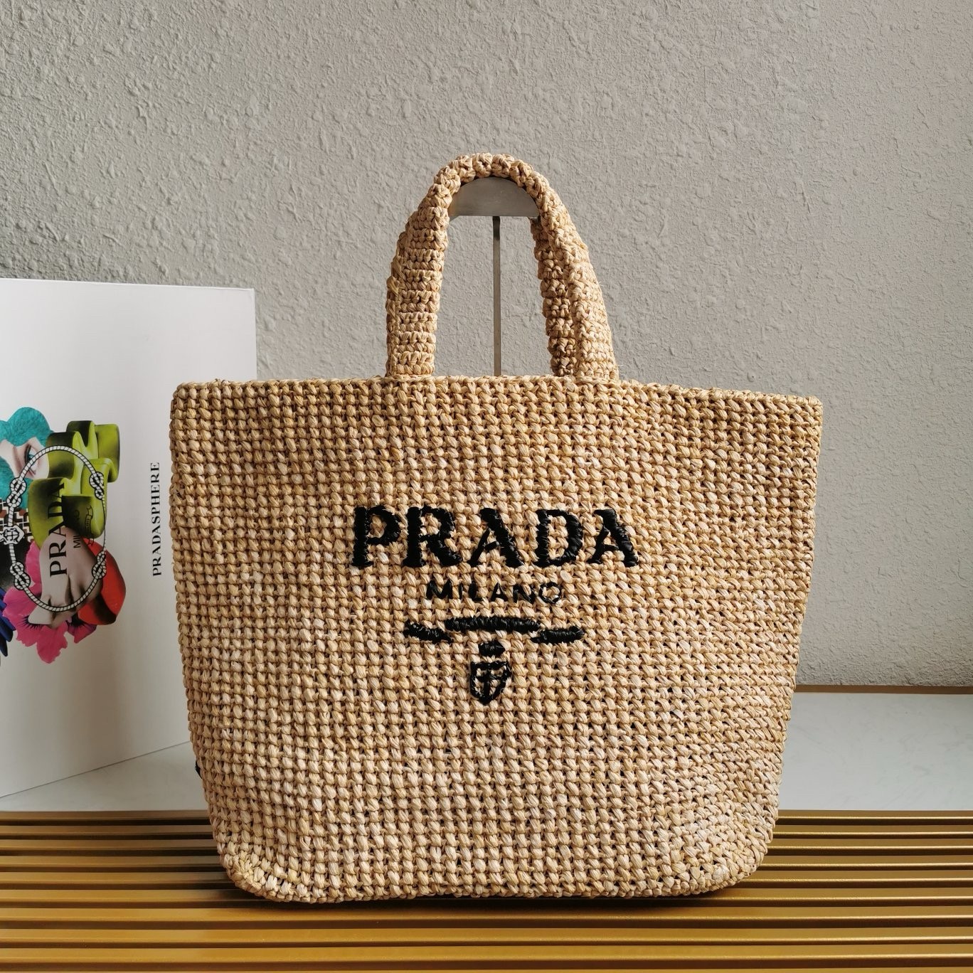 Pra*a large crochet tote bag in beige raffia-effect yarn