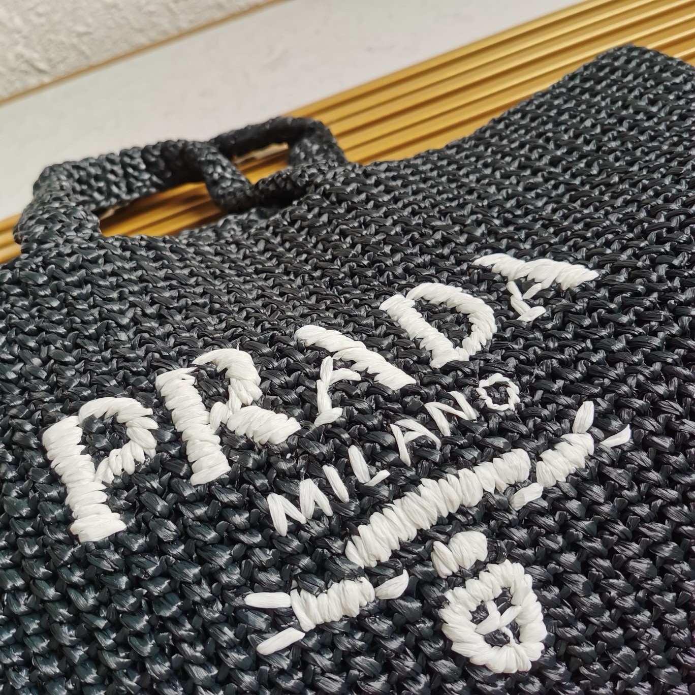 Pra*a large crochet tote bag in black raffia-effect yarn
