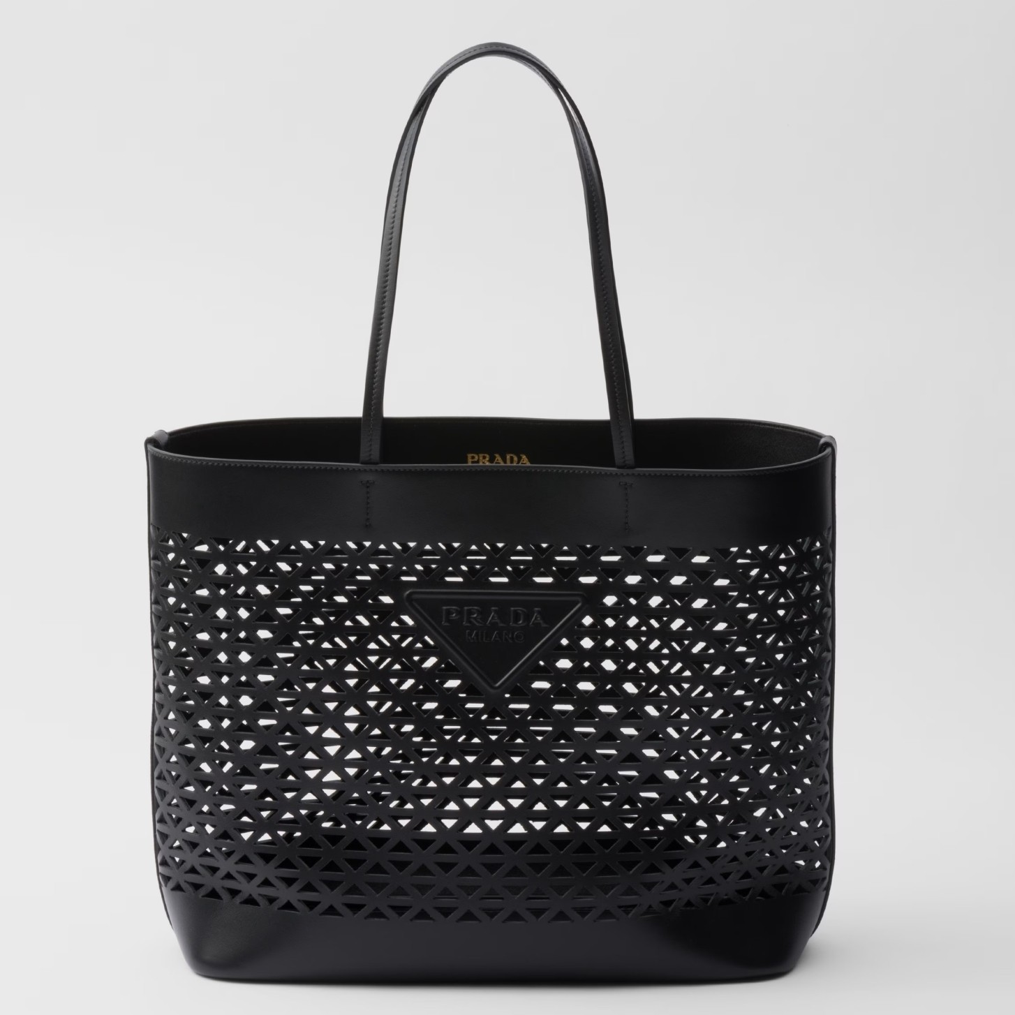 Pra*a large tote bag in black perforated leather