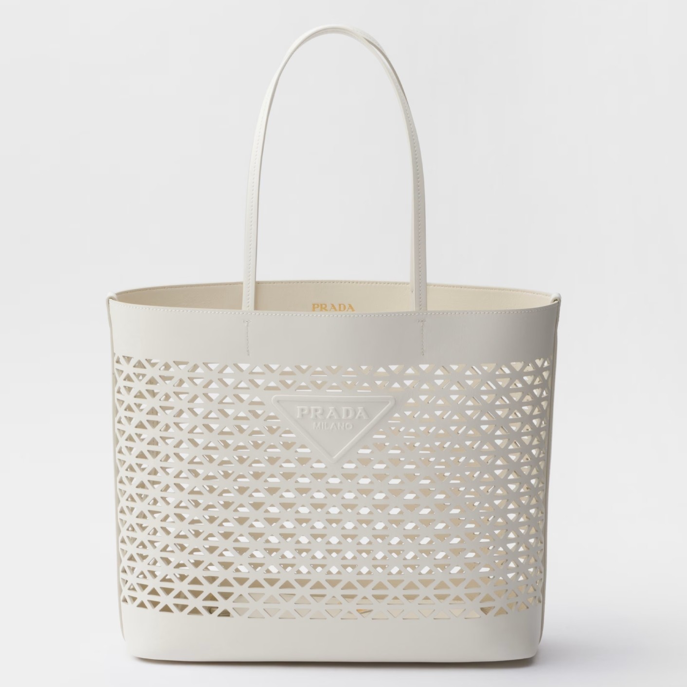 Pra*a large tote bag in white perforated leather