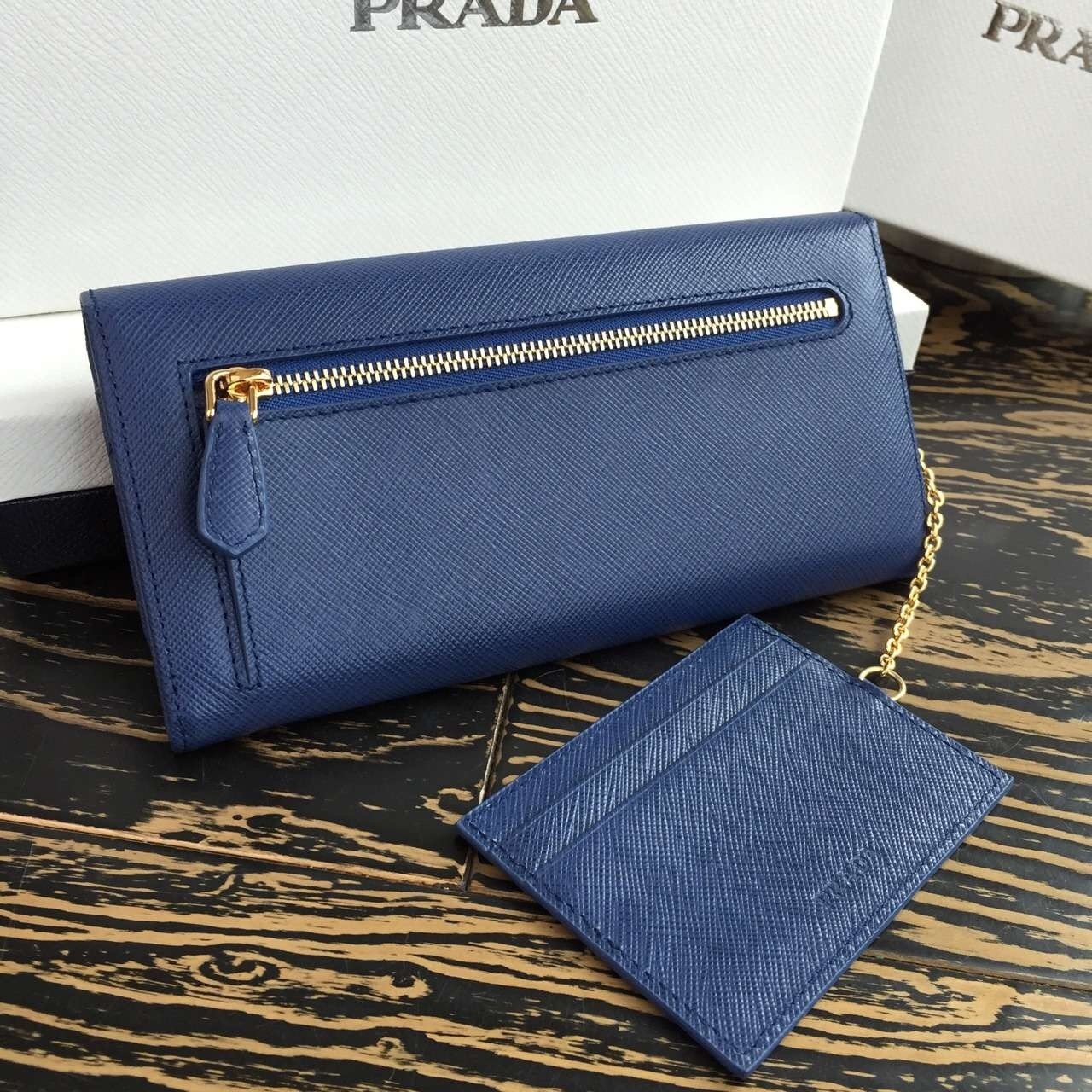 Pra*a continental wallet in blue saffiano leather