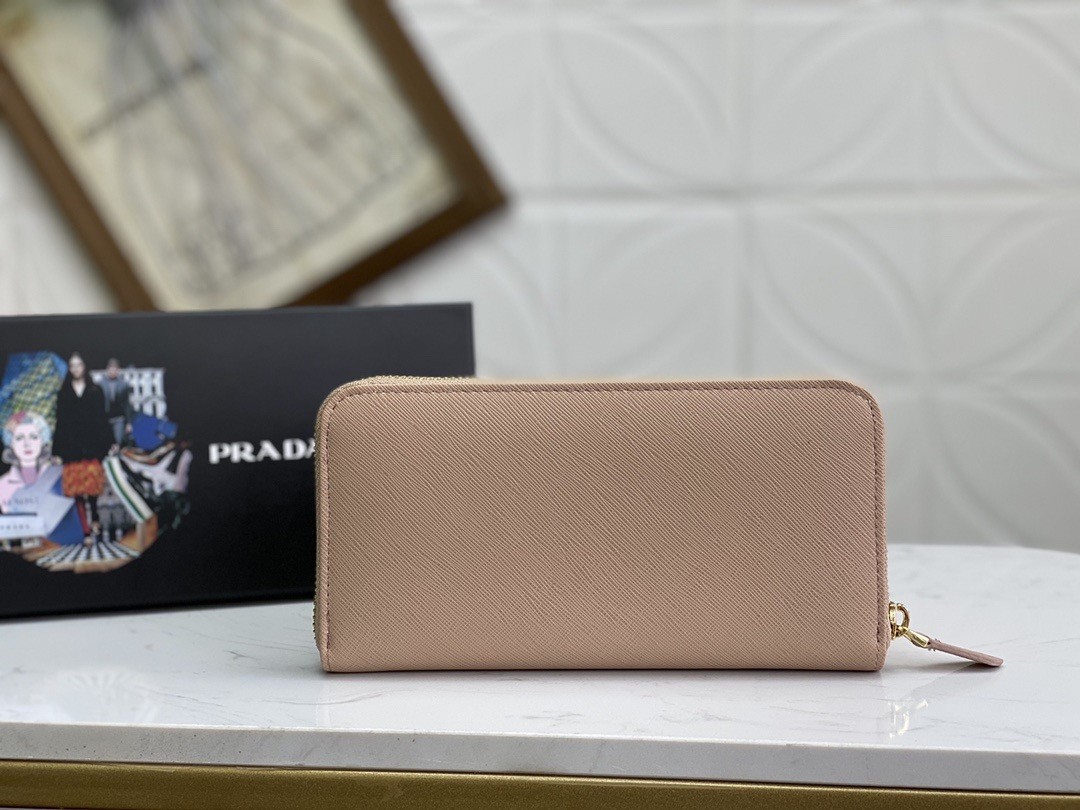 Pra*a zip around wallet in powder pink saffiano calfskin