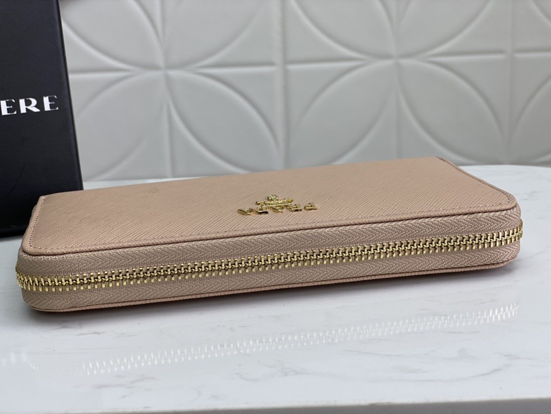 Pra*a zip around wallet in powder pink saffiano calfskin