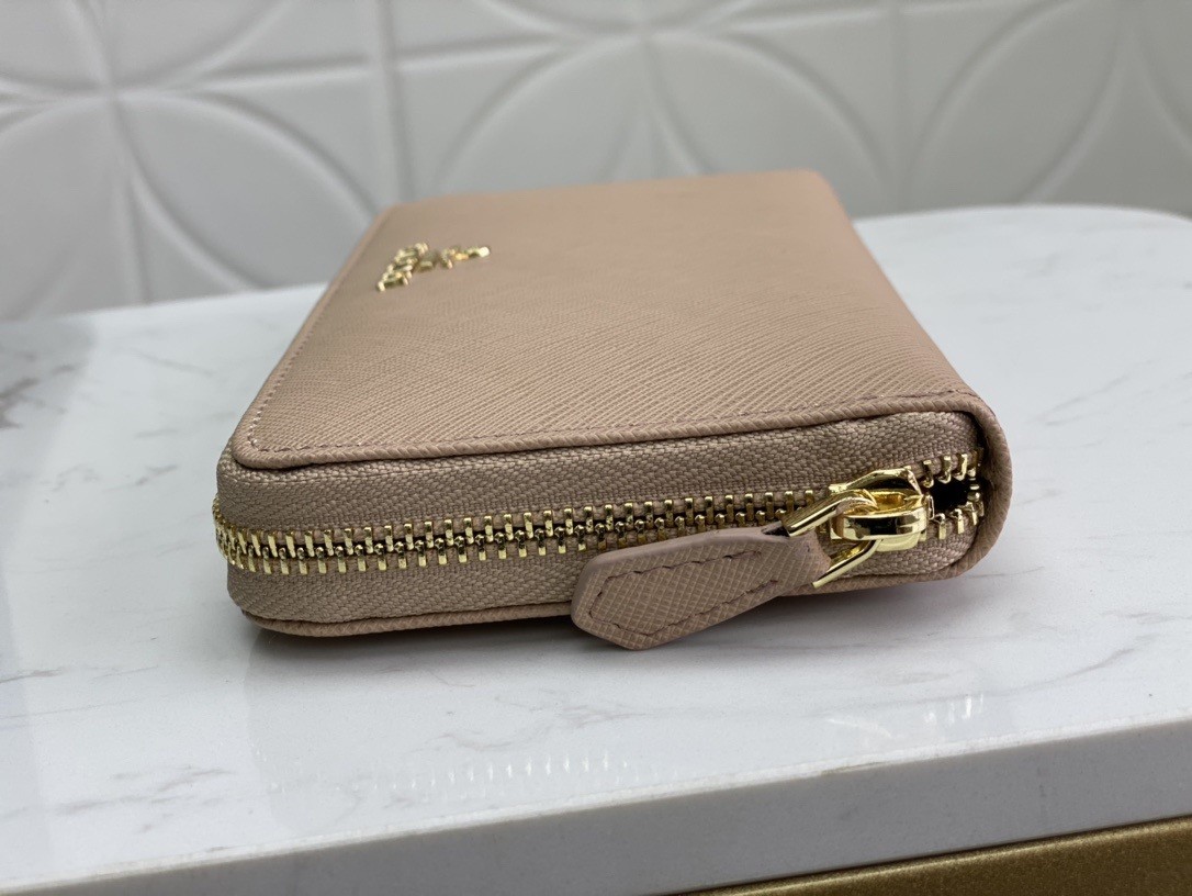Pra*a zip around wallet in powder pink saffiano calfskin