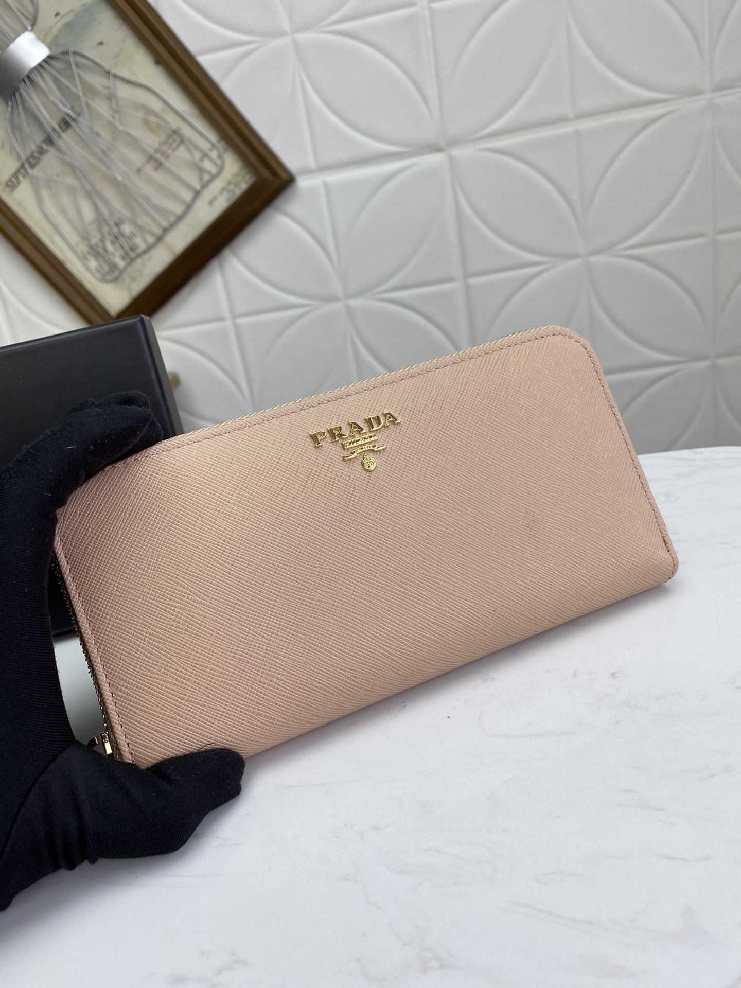 Pra*a zip around wallet in powder pink saffiano calfskin
