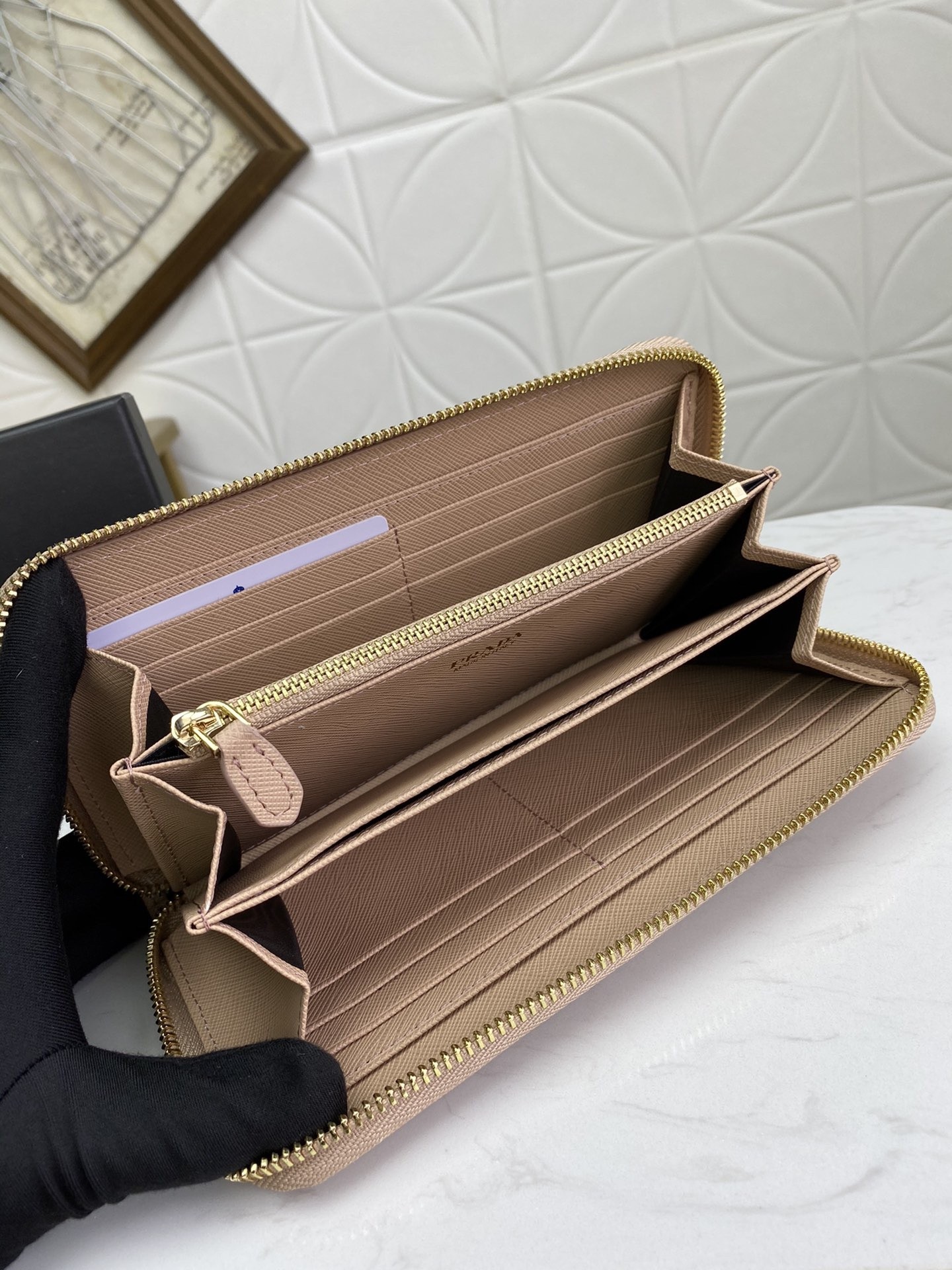 Pra*a zip around wallet in powder pink saffiano calfskin