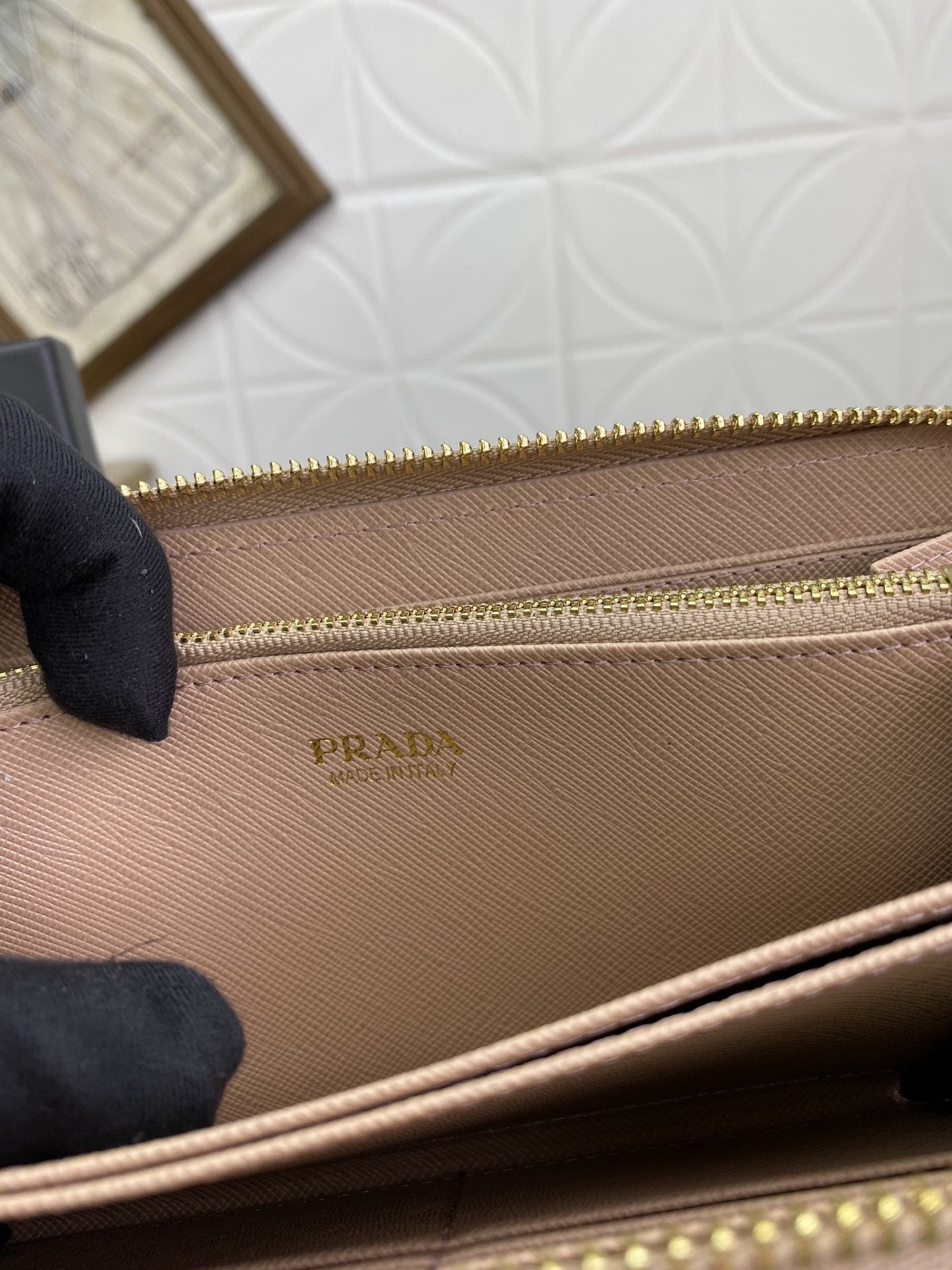 Pra*a zip around wallet in powder pink saffiano calfskin