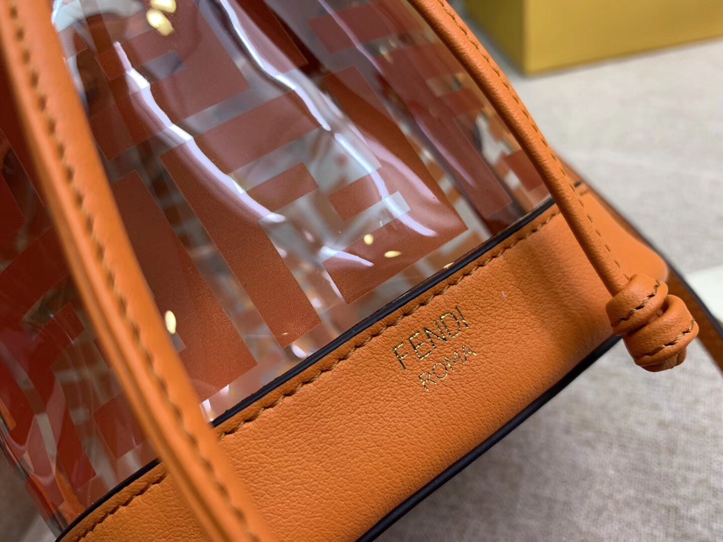 F**di orange mon tresor mini bucket bag in transparent pu