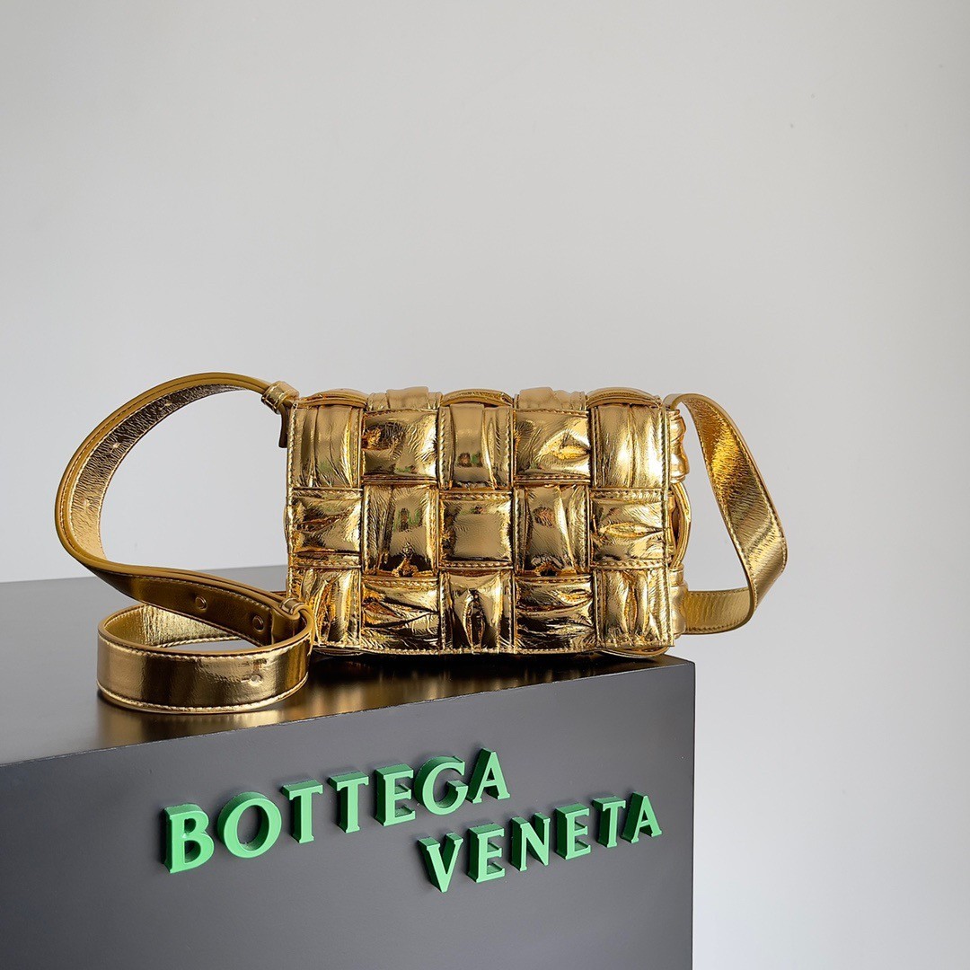bo*te*ga Ve*ne*ta small cassette bag in gold metallic lambskin