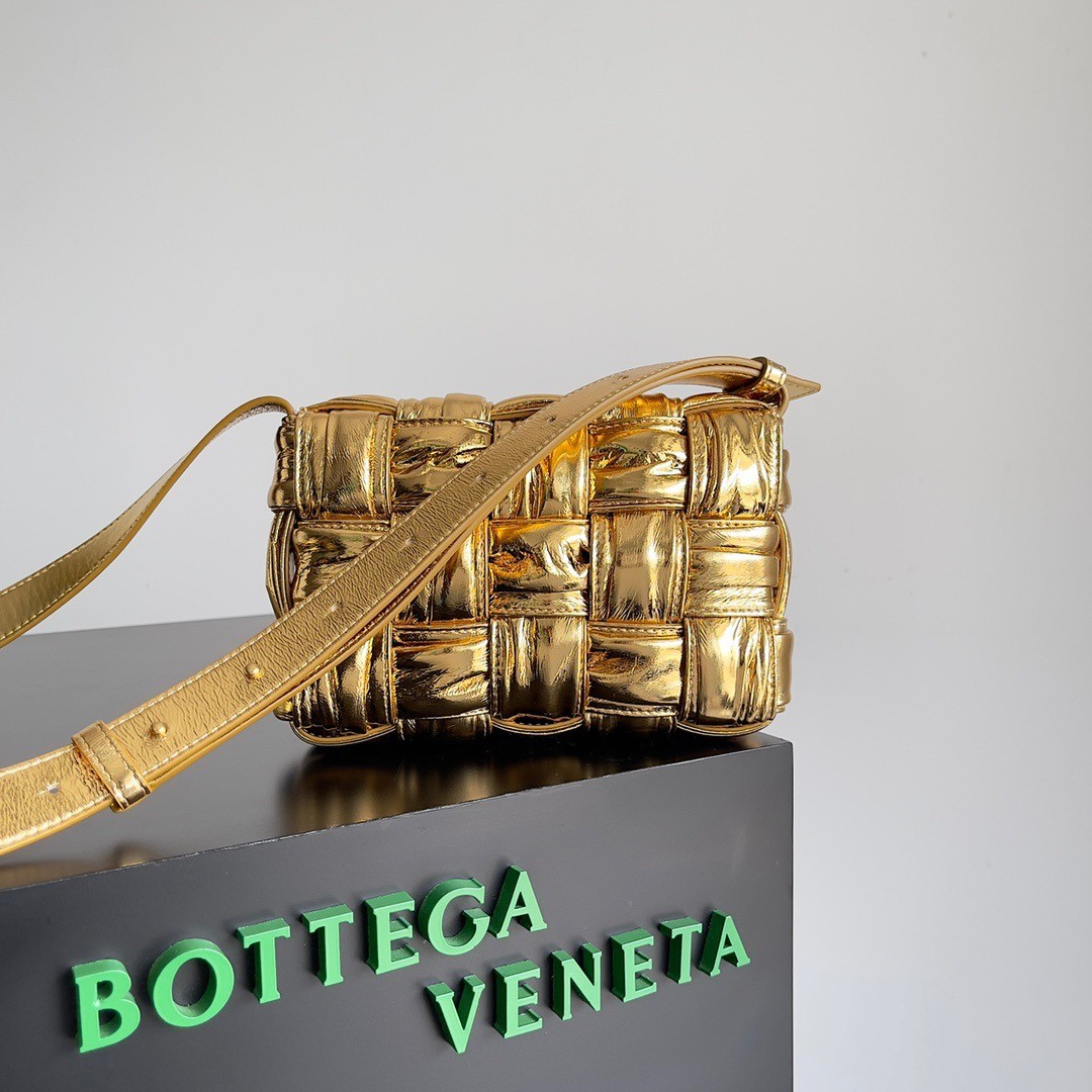 bo*te*ga Ve*ne*ta small cassette bag in gold metallic lambskin