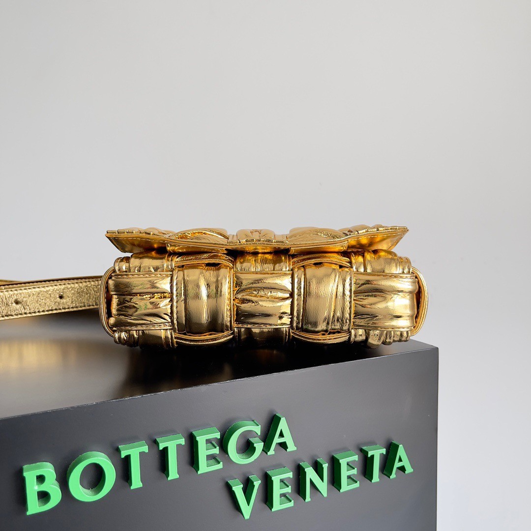 bo*te*ga Ve*ne*ta small cassette bag in gold metallic lambskin