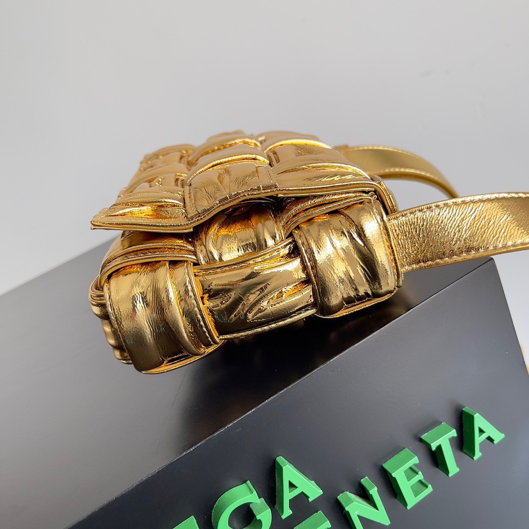 bo*te*ga Ve*ne*ta small cassette bag in gold metallic lambskin