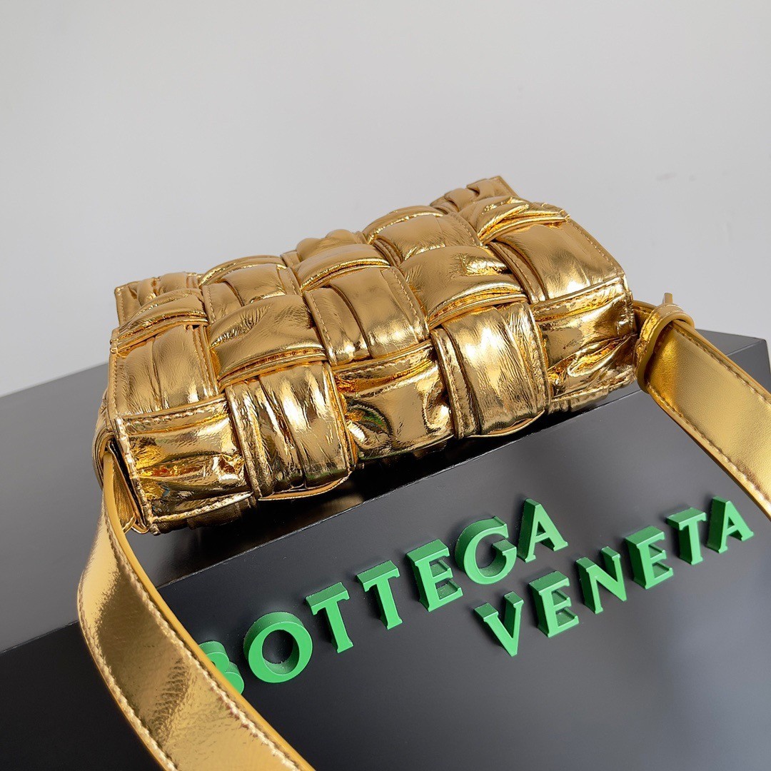 bo*te*ga Ve*ne*ta small cassette bag in gold metallic lambskin