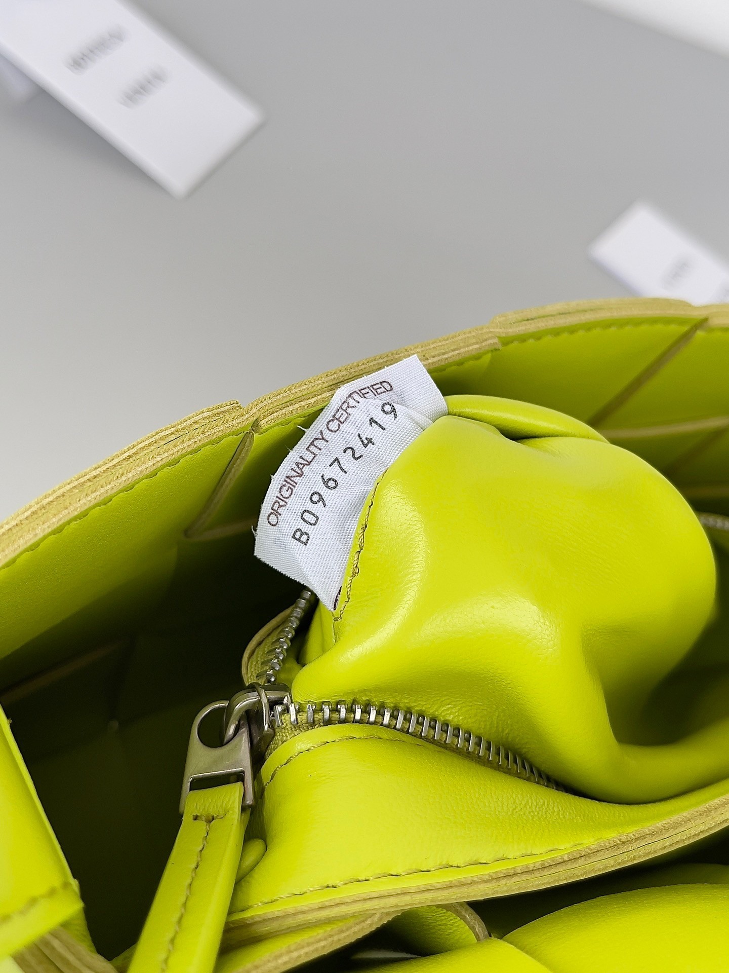 bo*te*ga Ve*ne*ta cassett bag in acid kiwi intrecciato lambskin