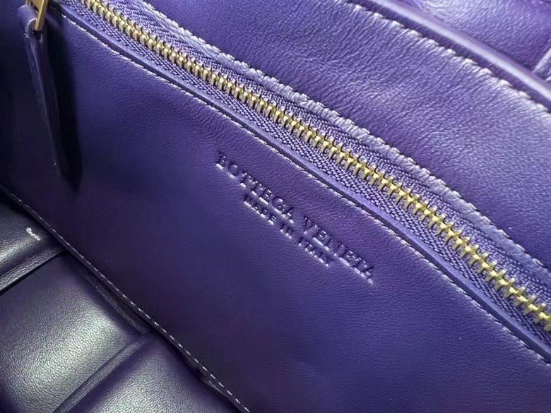 bo*te*ga Ve*ne*ta padded cassette bag in raisin deerskin
