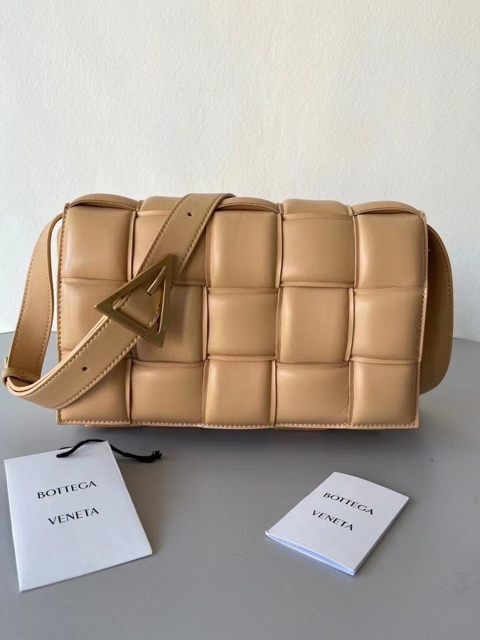 bo*te*ga Ve*ne*ta padded cassette bag in almond lambskin