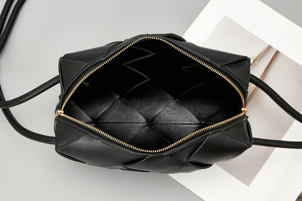 bo*te*ga Ve*ne*ta small cassette camera bag in black lambskin