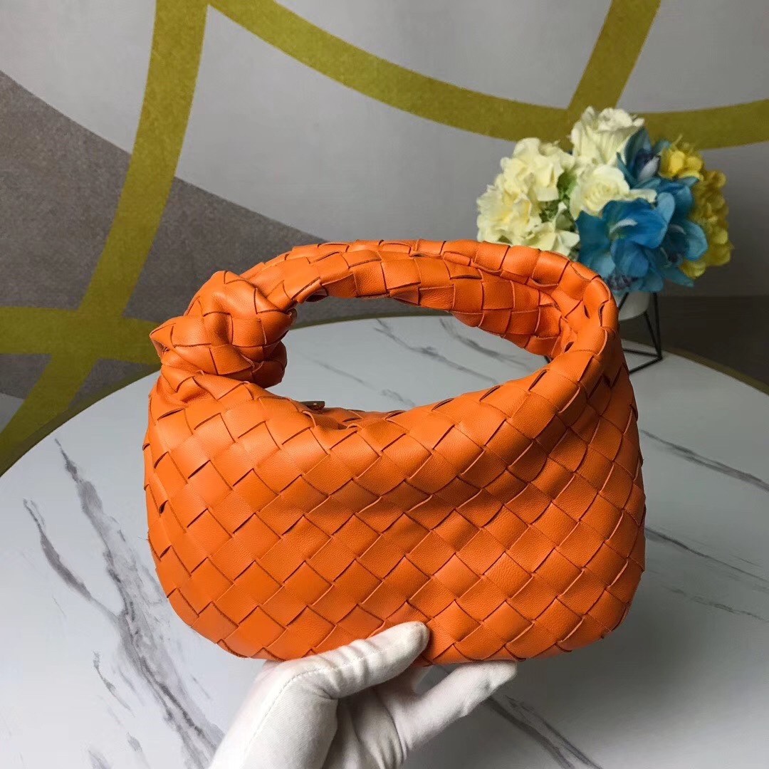 bo*te*ga Ve*ne*ta mini bv jodie bag in orange woven leather