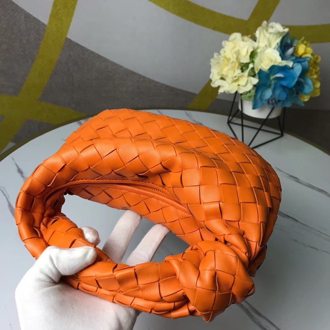bo*te*ga Ve*ne*ta mini bv jodie bag in orange woven leather