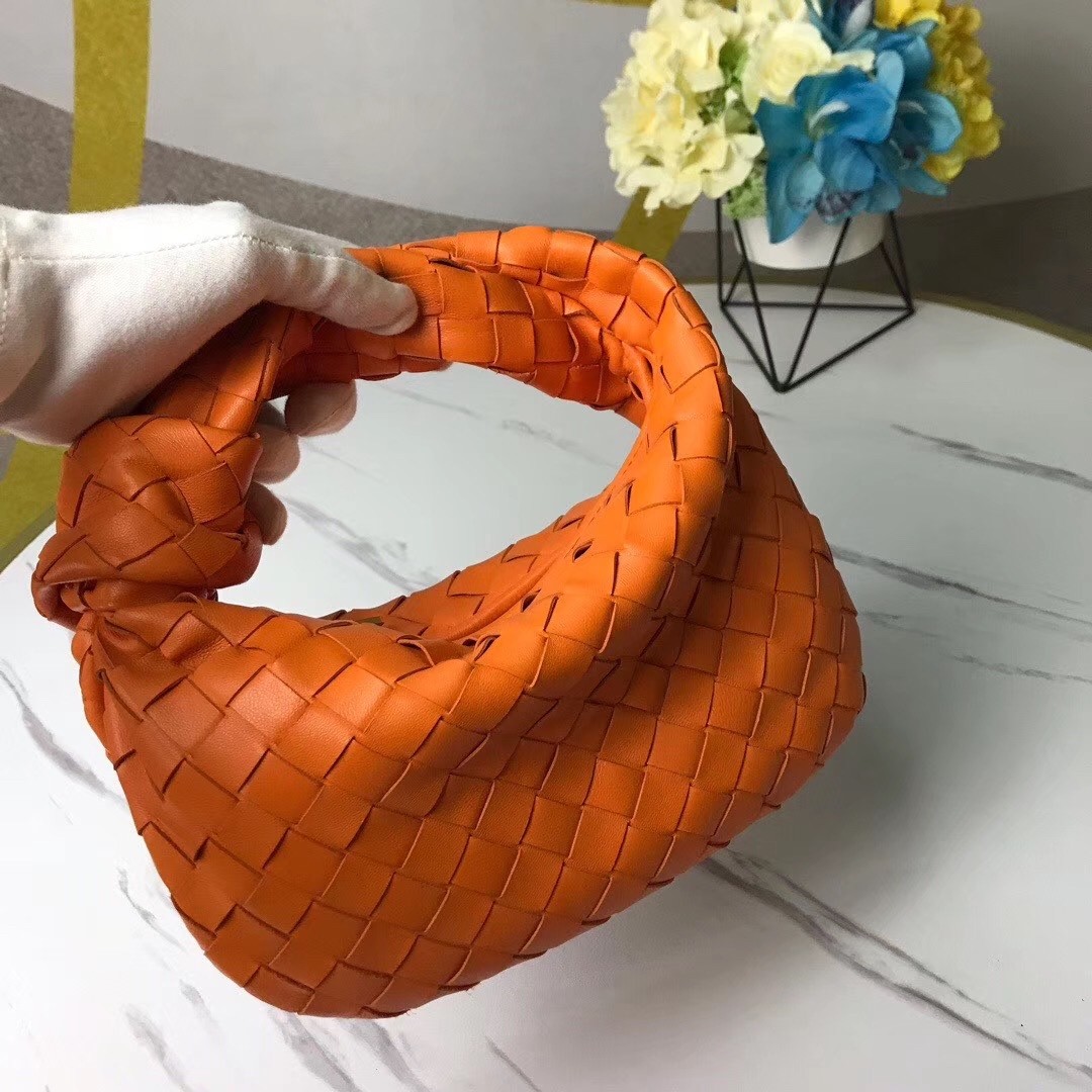 bo*te*ga Ve*ne*ta mini bv jodie bag in orange woven leather