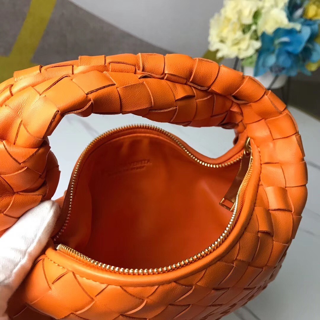 bo*te*ga Ve*ne*ta mini bv jodie bag in orange woven leather