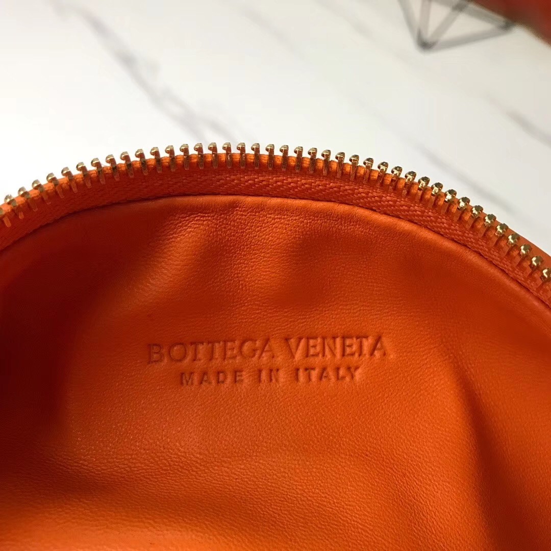 bo*te*ga Ve*ne*ta mini bv jodie bag in orange woven leather