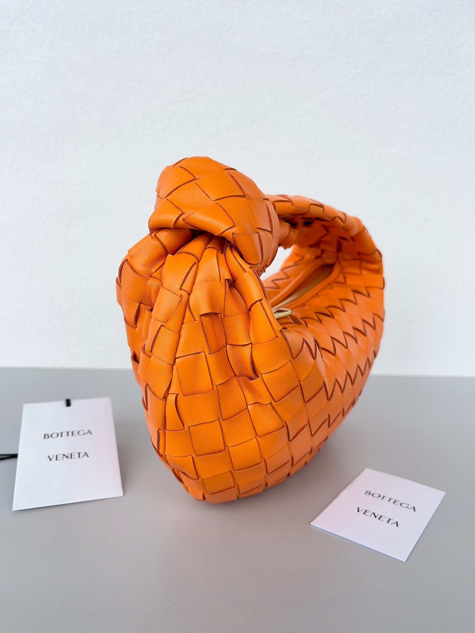 bo*te*ga Ve*ne*ta bv jodie mini bag in orange intrecciato lambskin