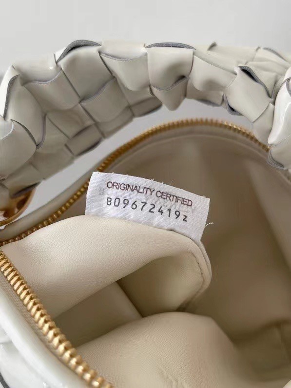 bo*te*ga Ve*ne*ta bv jodie mini bag in white intrecciato patent leather