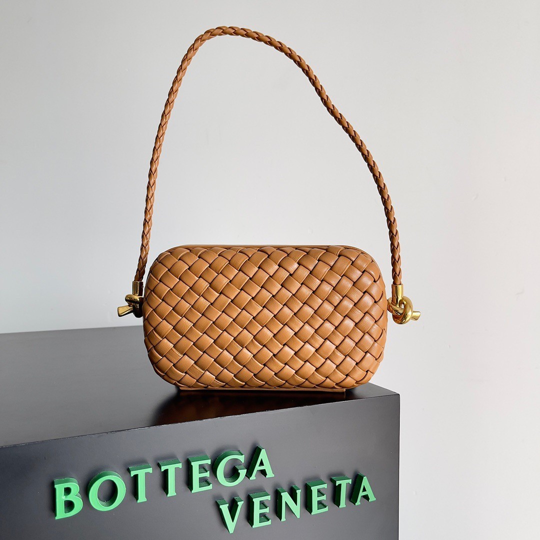 bo*te*ga Ve*ne*ta knot minaudiere on strap in camel intreccio lambskin