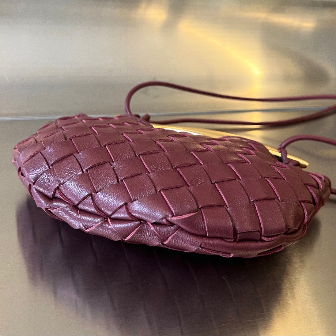 bo*te*ga Ve*ne*ta sardine mini bag in barolo intrecciato lambskin