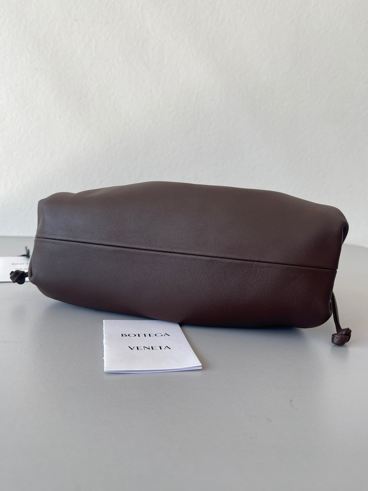 bo*te*ga Ve*ne*ta mini pouch bag in fondant calfskin