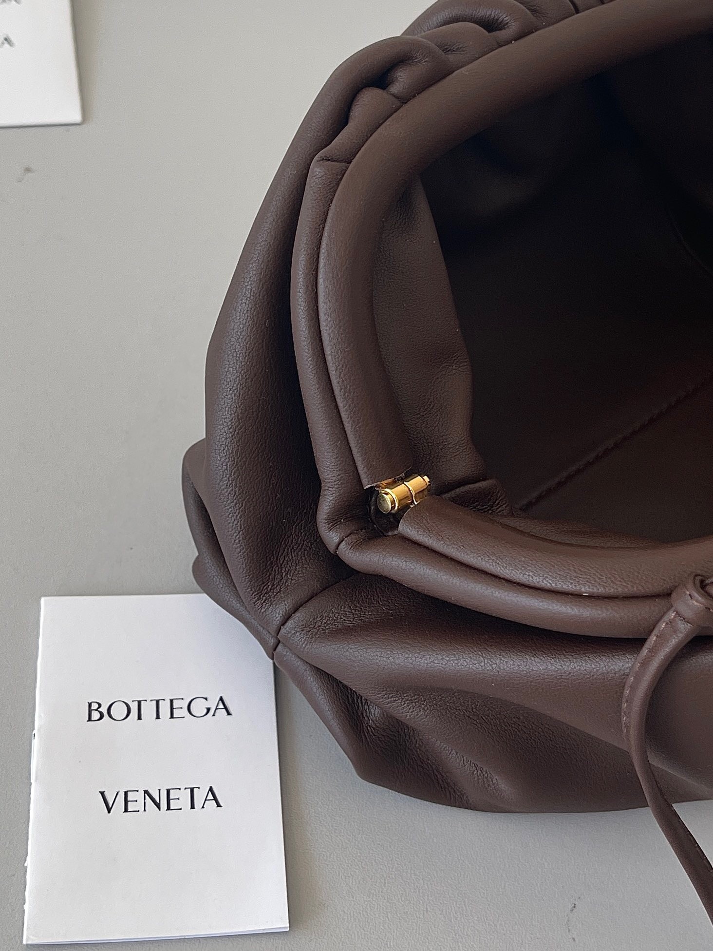 bo*te*ga Ve*ne*ta mini pouch bag in fondant calfskin