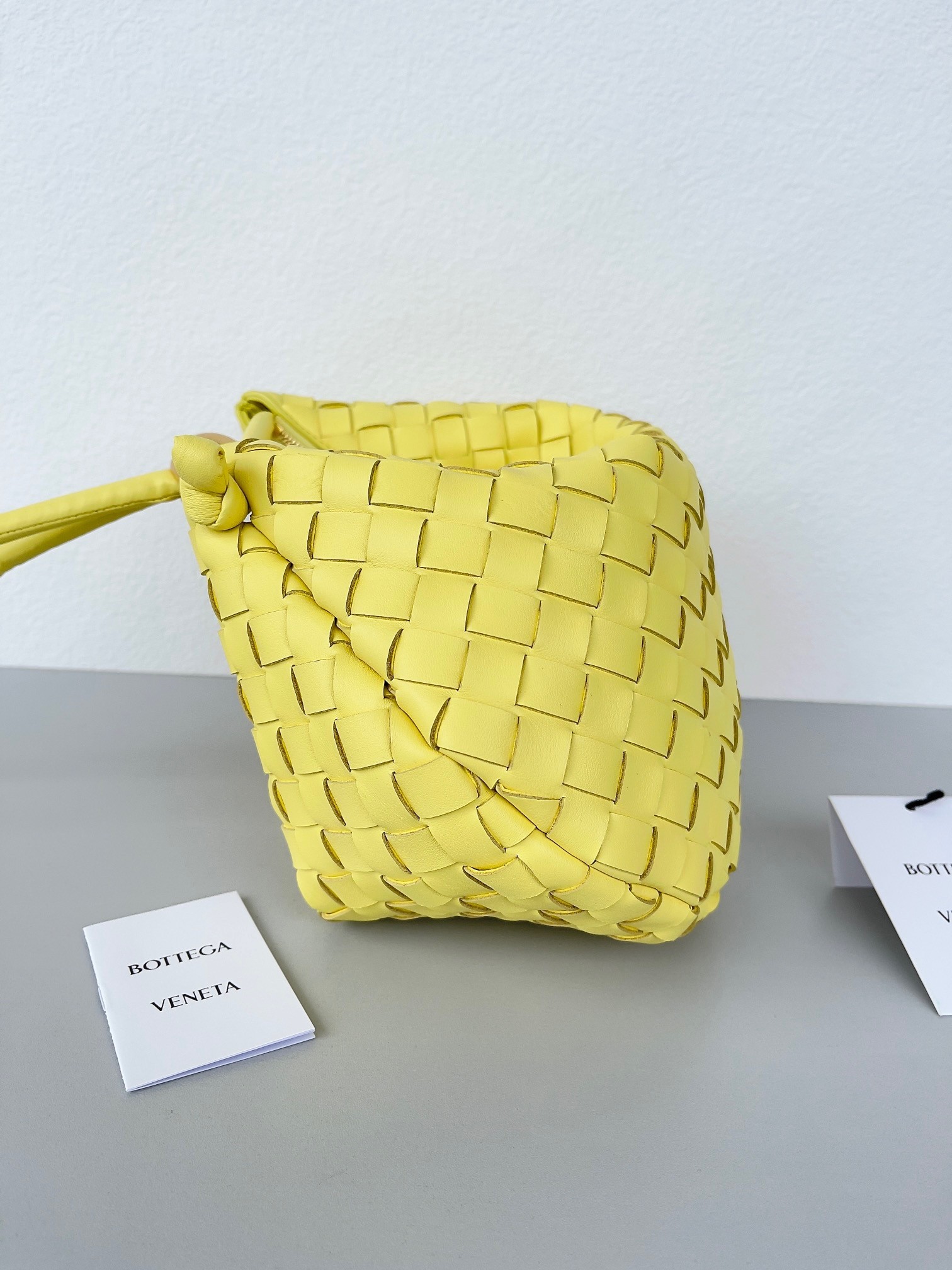bo*te*ga Ve*ne*ta turn bag in yellow intrecciato lambskin