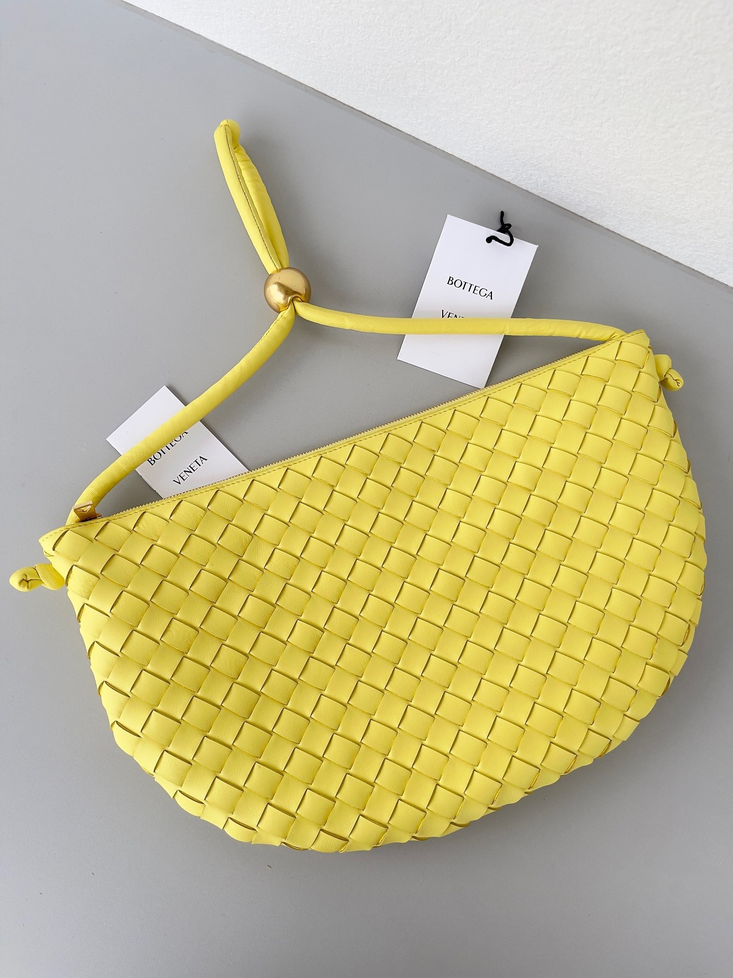bo*te*ga Ve*ne*ta turn bag in yellow intrecciato lambskin