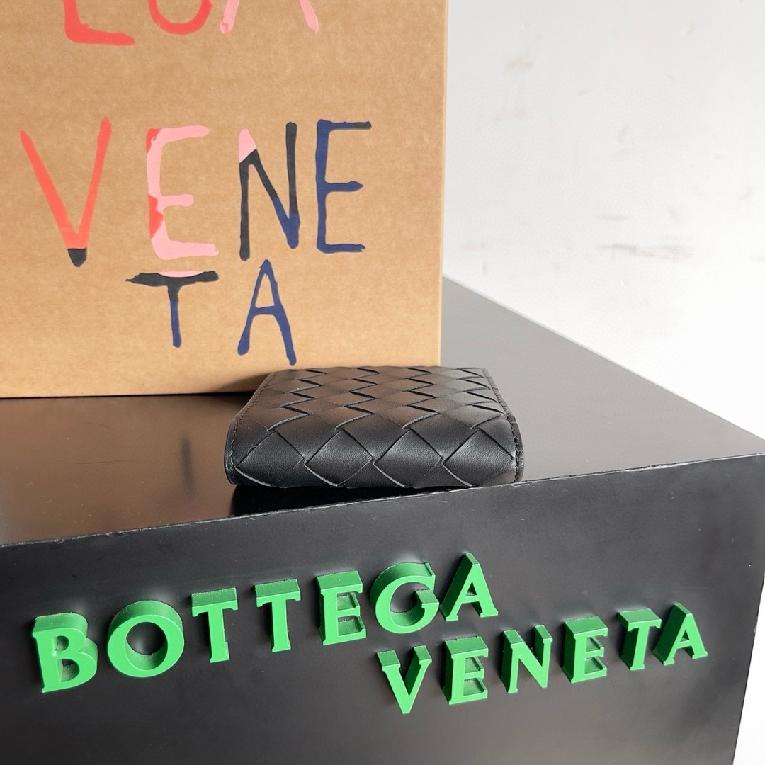 bo*te*ga Ve*ne*ta bi-fold wallet in black intrecciato calfskin