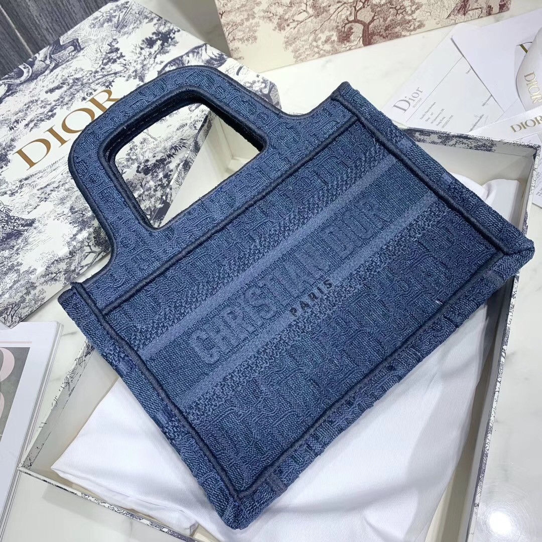 d*or mini book tote bag in De*1m blue oblique canvas