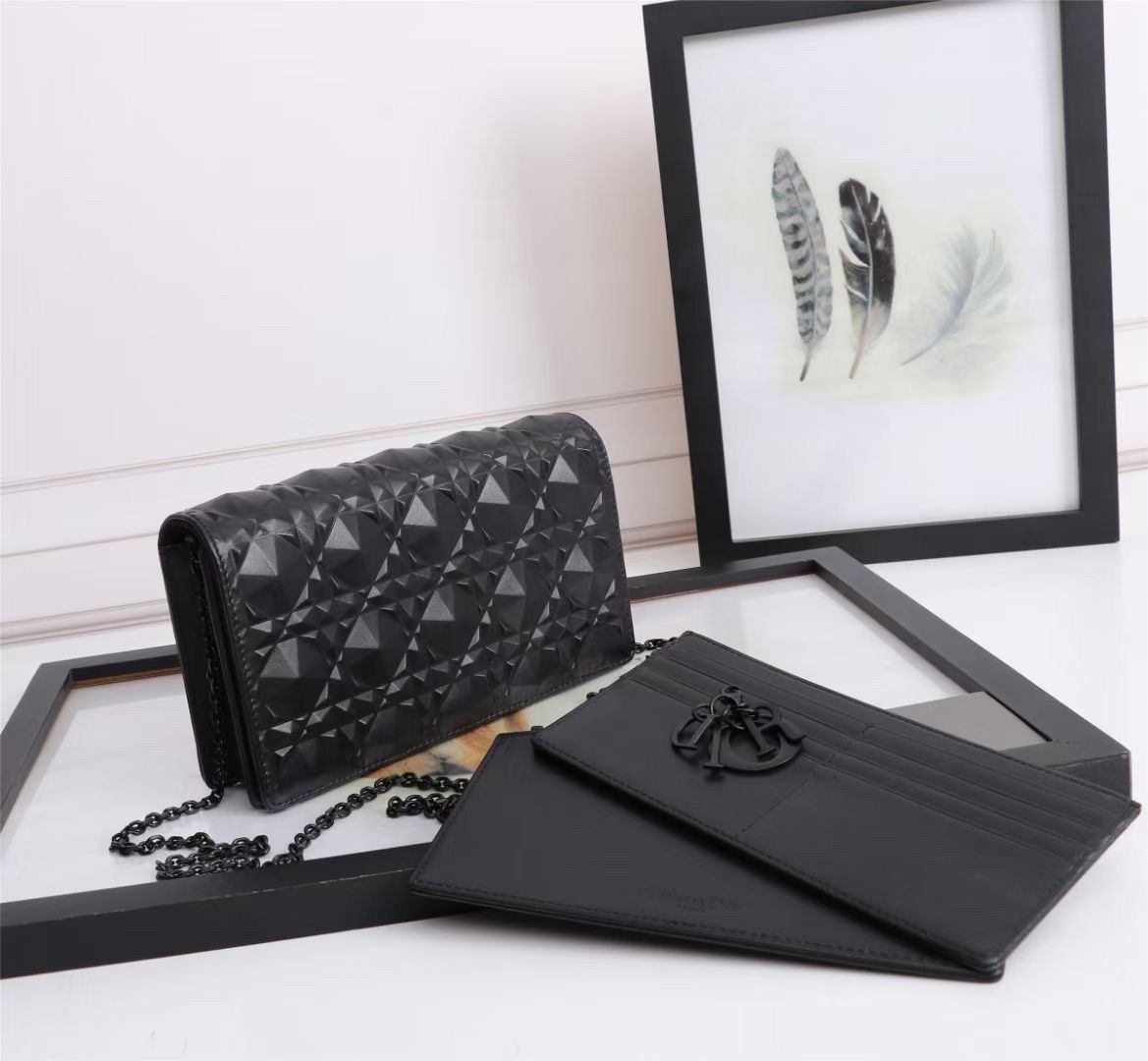 d*or lady d*or pouch in black Di*m*nd calfskin