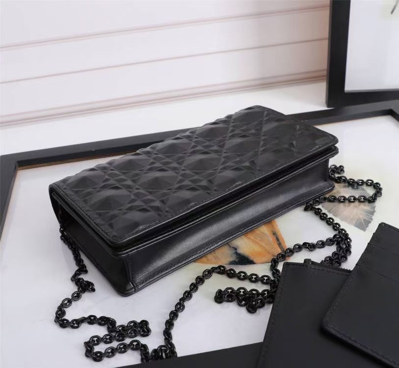 d*or lady d*or pouch in black Di*m*nd calfskin