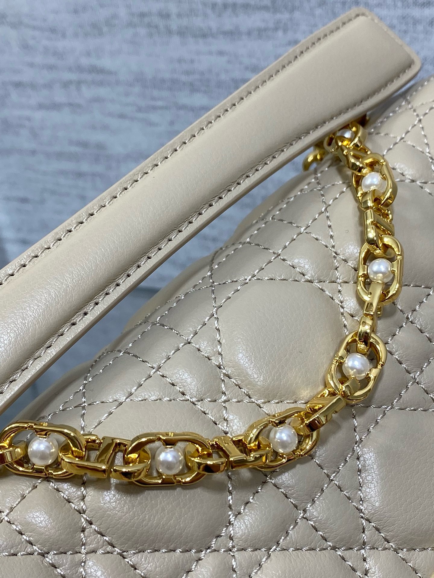 D*or small jolie top handle bag in beige cannage calfskin