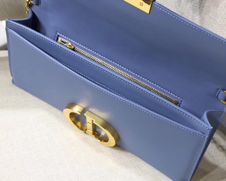 d*or 30 montaigne clutch bag in De*1m blue calfskin