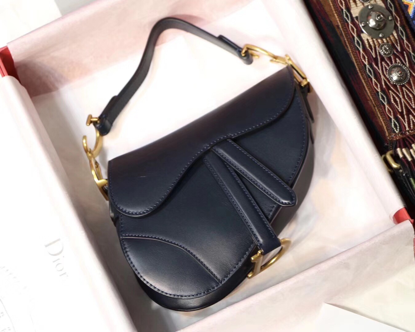 D*or mini saddle bag in blue calfskin