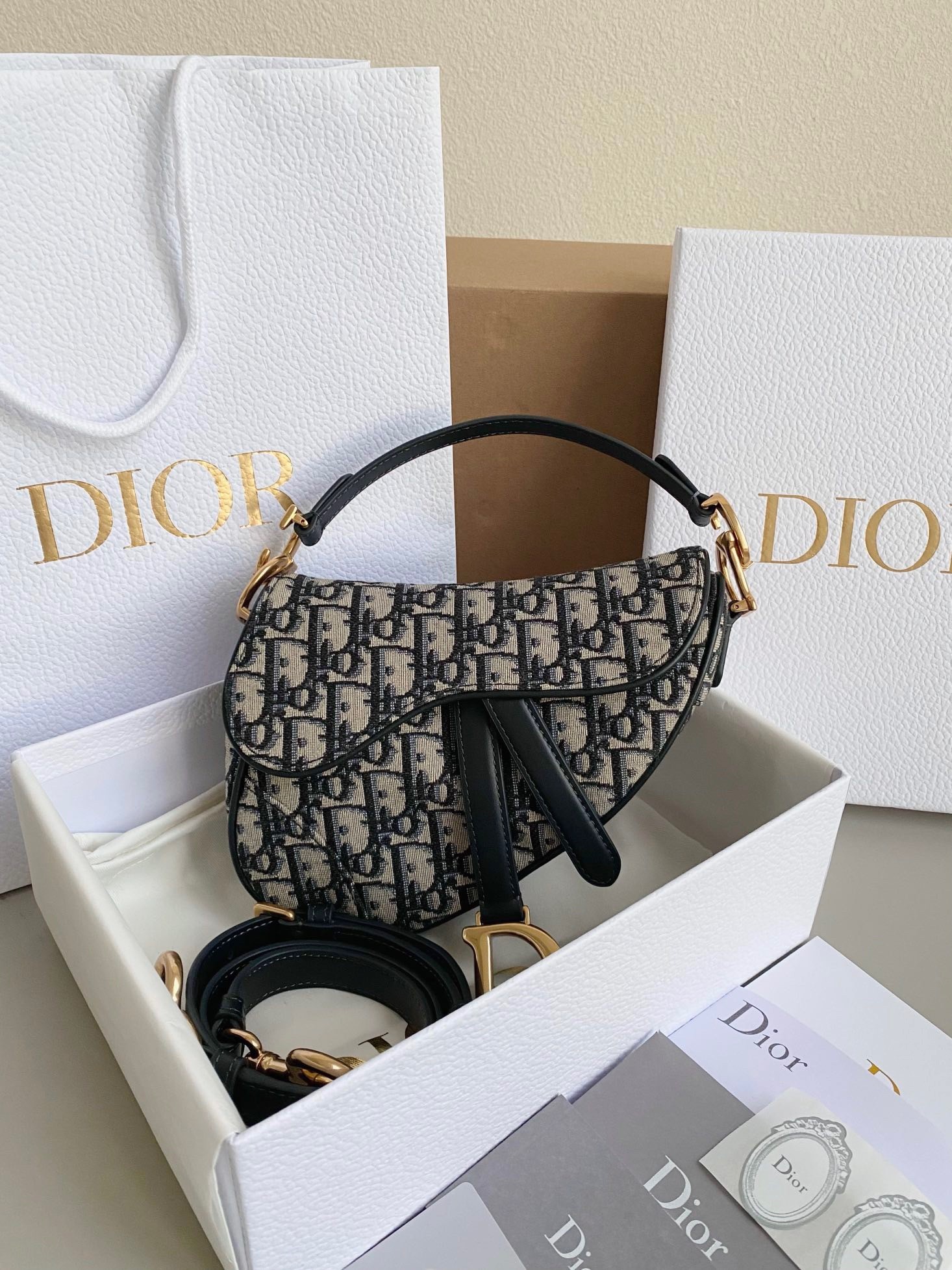 D*or saddle mini bag with strap in blue oblique jacquard