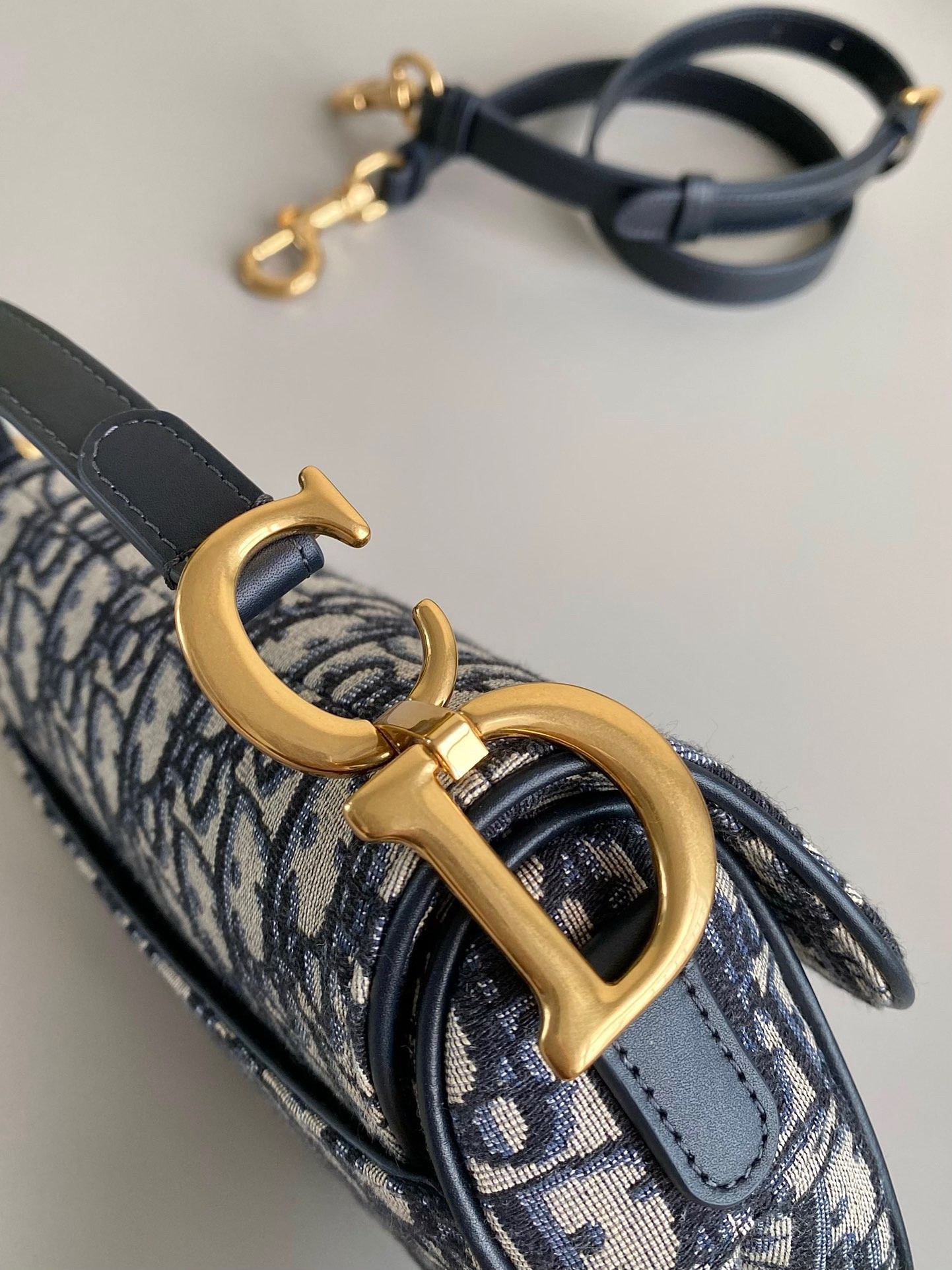 D*or saddle mini bag with strap in blue oblique jacquard
